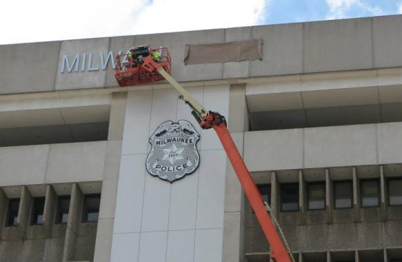 sign installation at police department