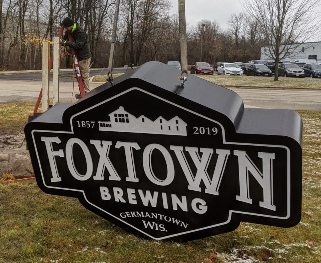 monument sign for foxtown brewing company