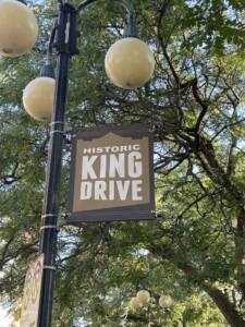 Completed environmental graphics installed along Milwaukee's Historic King Drive as part of the award-winning streetscape initiative.